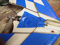 Name: 48.jpg
Views: 218
Size: 241.4 KB
Description: I locate the receiver on the bottom of the wing, ahead of the motor. I use duct tape to protect the receiver from moisture and dirt.
