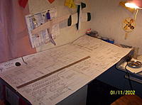 Name: Rascal build log 001.jpg
Views: 79
Size: 211.0 KB
Description: plans cut out and taped