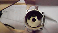 Name: DSCN1077.jpg
Views: 51
Size: 124.4 KB
Description: See that concentric hole in the crankshaft ?That's where our extension shaft will be introduced in the forward end of this drive system.