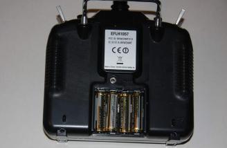 The 4 supplied AA Alkaline Batteries installed into the supplied transmitter
