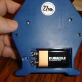 A nine volt battery goes into the back of the transmitter.