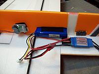 Name: 100_2054.jpg
Views: 90
Size: 167.5 KB
Description: battery slot centered in CG of plane