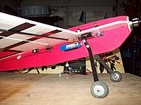 Name: 100_2198.jpg
Views: 79
Size: 197.5 KB
Description: Side view of new location of battery and landing gear