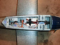 Name: CIMG1651.jpg
Views: 115
Size: 169.7 KB
Description: 1/8" plywood battery tray epoxied with velcro strap and strip.