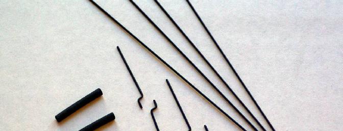 All of the pieces used to make the aileron link rods