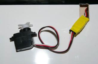 Securing the servo extension with electrical tape