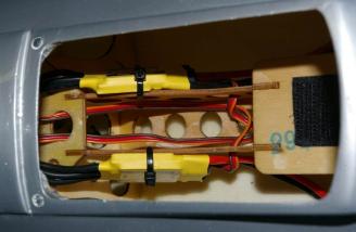 A pair of Electrifly 25 Amp ESCs mounted like saddlebags