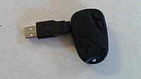 Name: SAM_0490.jpg
Views: 50
Size: 67.9 KB
Description: Doggle attached to camera for downloading or recharging battery