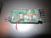Name: IMG_0169.jpg
Views: 42
Size: 190.5 KB
Description: GPS Pins Installed and wire fished in place
GPS wire to be soldered to pin 30 of smd chip
