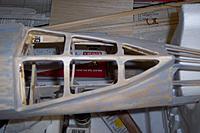 Name: removing bottom because of weight of the epoxy coating.jpg
Views: 122
Size: 150.5 KB
Description: Removed the aft section of the hull and replaced with 1/32 birch, with epoxy on the outside surface only.