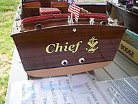 Name: Bob'sTent.5.jpg
Views: 60
Size: 217.7 KB
Description: I got the Lyman's OH registration numbers and stern graphics from Callie Graphics.  The anchor and carpenter's square is the old Revenue Cutter Service rating badge for Ship's Carpenter, which is now Damage Controlman in the USCG.