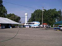 Name: Hydro.jpg
Views: 26
Size: 293.5 KB
Description: A coupl of hydros parked near the entrance gate.  The white tent on the left was for the marine mart vendors selling nautical junque. I could have set my model display in there.