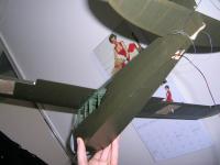 Name: DSCN0529.jpg
Views: 170
Size: 53.5 KB
Description: hole @ rear is an air out vent and rx exit. Pull Pull on the rudder and P/R on the elv