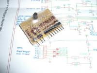 Name: CIMG1059_0640.jpg
Views: 2924
Size: 34.8 KB
Description: The interface to multiplex the Spektrum AR7000 PWM signals bag into a single PPM channel: 8 diodes, 3 resitors, and 1 transistor. Works like a charm as the signals are output sequentially. Should work for any receiver which outputs its PWM signal sequenti