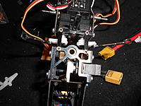 Name: DSCN3561.jpg
Views: 17
Size: 209.2 KB
Description: The balls were originally installed like this. But in examining swash travel. The linkages bent and rubbed against the raised ridge along the servo arm on this side. I ended up moving them to the other side. More pics on that later.