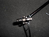 Name: DSCN4027.jpg
Views: 11
Size: 266.5 KB
Description: Link up the pitch slider and tail grips as shown. and the tail rotor is complete.