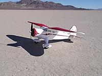 Name: DSCF2810-1.jpg
Views: 108
Size: 232.6 KB
Description: Now down at the dry lakebed, after flying a couple of 2200s through her; looking good in the desert sun...
