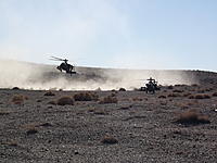 Name: DSCF3101.jpg
Views: 108
Size: 266.7 KB
Description: The AH-64's arrive for their pilot's mission brief. Due to the detailed nature of integrating mortars and helos, they attend every rehearsal.