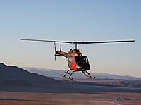 Name: DSCF3164-1.jpg
Views: 94
Size: 93.9 KB
Description: The same OH-58 buzzing my HMMWV...needless to say, I didn't mind!