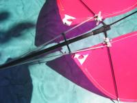 Name: pogon na repu.jpg
Views: 109
Size: 55.9 KB
Description: Tail feathers are slided onto carbon rods, that are fixed at rear tailboom end. Hinge is made from short pieces of plastic tubes, that are sewn onto tail feathers.
I use spare servo horns for the ruderhorns.