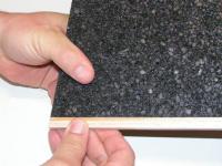 Name: PICT0019.jpg
Views: 780
Size: 118.4 KB
Description: Glue the subtrailing edge to the trailing edge of the foam with 3M77 sprayed heavily on both sides.  Allow to tack up and press firmly.  You only have one shot at this with this method!