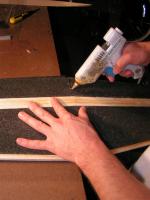 Name: PICT0076.jpg
Views: 635
Size: 79.5 KB
Description: After gluing in one half of the spar, glue in the other half the same way.  Ensure perfect alignment, then use a glue gun to glue the center of the two cores together.