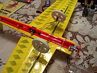 Name: 005.jpg
Views: 99
Size: 274.6 KB
Description: Wheels installed, ready to go..Braced everything and mounted right over the wing spar for strength.