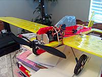 Name: 007.jpg
Views: 108
Size: 212.2 KB
Description: Turnigy esc mounted other side of fuse, plays "Oh Susanna"  when turned on...How cool, So I have the "Dollar Bill" plane finished...