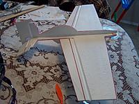 Name: 003.jpg
Views: 96
Size: 280.3 KB
Description: Reshaped the fuse to look "slightly" sportier...Dur
The red line seen was the layout from the original Bill design...made bigger and better, wing...