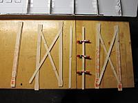 Name: Popcicle sticks.jpg
Views: 71
Size: 155.3 KB
Description: Four of these will be our struts. They'll keep the halves of our wings permanently stiff.