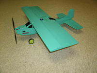 Name: GEDC0051.jpg
Views: 180
Size: 60.3 KB
Description: 30" high wing with a KFM2 wing with 50% step with the fuselage formed after the order of a Blu-Baby. I build the fuselage different, wider and made from Dollartree foamboard using a brushless motor. This plane is history, foam planes don't have a rea