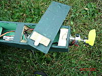 Name: GEDC0230.jpg
Views: 75
Size: 133.6 KB
Description: Popsicle stick is used to hold down back of battery cover. A flat metal washer is under clothe at the front and painted over to hold to magnet.