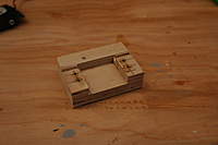 Name: MXC #2 007.jpg
Views: 275
Size: 30.2 KB
Description: Long before I knew of servo frames I black CA'd plastic angle to the servo. This is a jig I use to glue plastic angle to servo. It's also used to drill the angle for mounting screws.