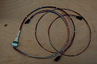 Name: MXC 4 001.jpg
Views: 312
Size: 47.8 KB
Description: Wing harness using Tefzel wire. 22ga. for plus and minus and 24 ga. for signal. Each servo get's all three wires. Flaps draw alot in butterfly. Harness from receiver to servos weigh 40 grams per side. Tied together with waxed string.