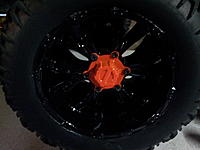 Name: 20130104_004003.jpg
Views: 61
Size: 120.1 KB
Description: Painted Rims Black with Orange insert