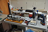 Name: DSC_0085.jpg
Views: 37
Size: 176.9 KB
Description: Four foot table, shelf, small lathe and drill press now inside house.