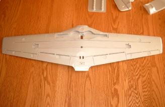 The bottom of the wing has cutouts for the fiberglass wing stiffener, aileron servos, retracts, and flap torque rods.  The ailerons and flaps are also easy to separate from the wing.