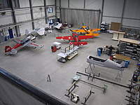 Name: 085.jpg
Views: 2378
Size: 83.8 KB
Description: Sbach aircraft in various stages of completion.