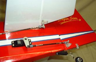 The factory cut out for the rudder servo was placed as close as possible to the rudder to keep the linkage short and provide positive control.