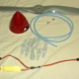 Fuel tubing, propeller, spinner, extra long servo arms, and fuel line caps rounded out the purchases needed to complete the SuperStar. (also shown here is the 