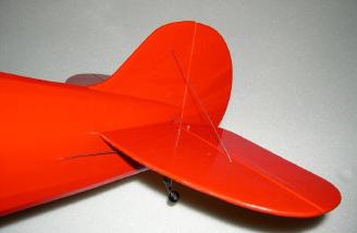 Shim gap covered with red Ultracote. Tail brace wire installed.