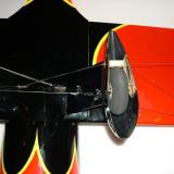 The wires then pass through the wheel pants, go through the wing, and terminate at the battery hatch. The holes that the wires pass through are all factory drilled.