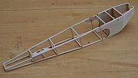Name: esc 315.jpg
Views: 28
Size: 129.6 KB
Description: After sanding the fuselage looks a bit like this. That plate near the tail is the rudder pushrod exit.