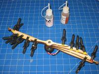 Name: m1c 8.jpg
Views: 812
Size: 74.1 KB
Description: All parts epoxied together and sitting on the 750 Kv Bell outrunner.