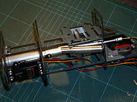 Name: P1040801.jpg
Views: 107
Size: 277.9 KB
Description: STAGE 5: Breach servo moves forward to release the spent cartridge, note the spring steel catches to pull the cartridge out of the breach