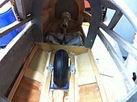 Name: ASK-13_NoseWheelisIn.jpg
Views: 56
Size: 247.2 KB
Description: Tow release attached to the hardwood noseblock plus the wheel assembly installed on the rails. I'm so glad I waited until AFTER these jobs were done before planking the outside.