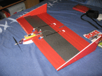 Name: IMG_1189.gif
Views: 209
Size: 286.1 KB
Description: This shows the tape reinforcing, dont leave it off..
the esc is under the wing on the side of the fuz directly under where the battery can be seen