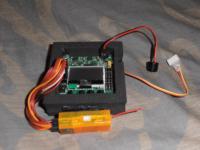 Name: P7180091.jpg
Views: 168
Size: 66.2 KB
Description: the alarm lead was soldered in place to fit the ballance plug that all batteries have..I use 3 cell lipo's
the board is held in the foam with a small ammount of cool melt ahd. at each corner..
Velcro holds the foam to the model
