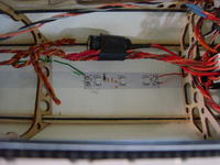 Name: DSC05574.jpg
Views: 111
Size: 82.8 KB
Description: Lights inside the plane look cool at night.  These light up the canopy in red.