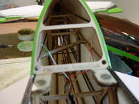 Name: DSC05575.jpg
Views: 100
Size: 80.3 KB
Description: Detail on the top fuse lights.  The top fuse, canopy and cowling all lit on the same circuit.